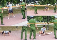 Chàng trai không đeo khẩu trang, thản nhiên tập thể dục trước mặt công an