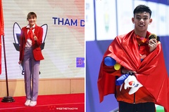 Quách Thị Lan và Nguyễn Huy Hoàng cầm cờ đoàn thể thao Việt Nam tại Olympic Tokyo 2021