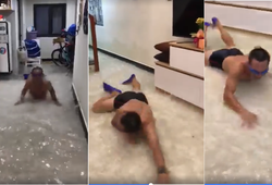 Cười bể bụng runner Đà Nẵng trổ tài bơi trong nhà ngập lụt