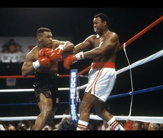 Knockout Larry Holmes, Mike Tyson trả thù cho Muhammad Ali