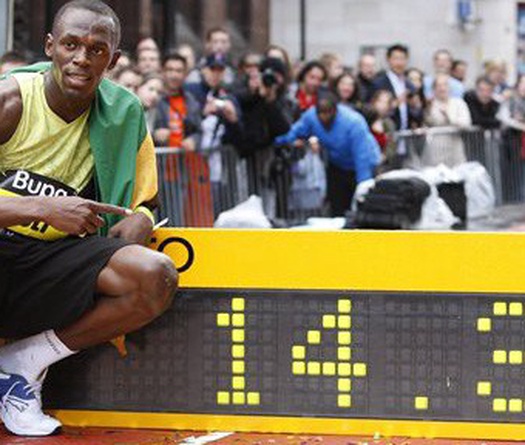 Usain Bolt: Lời mời của Sir Alex Ferguson và kỷ lục chạy 8,7 giây dưới mưa