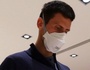 Giữa lúc dự định kiện chính quyền Úc, Djokovic bị làng tennis đồng loạt ép phải tiêm chủng