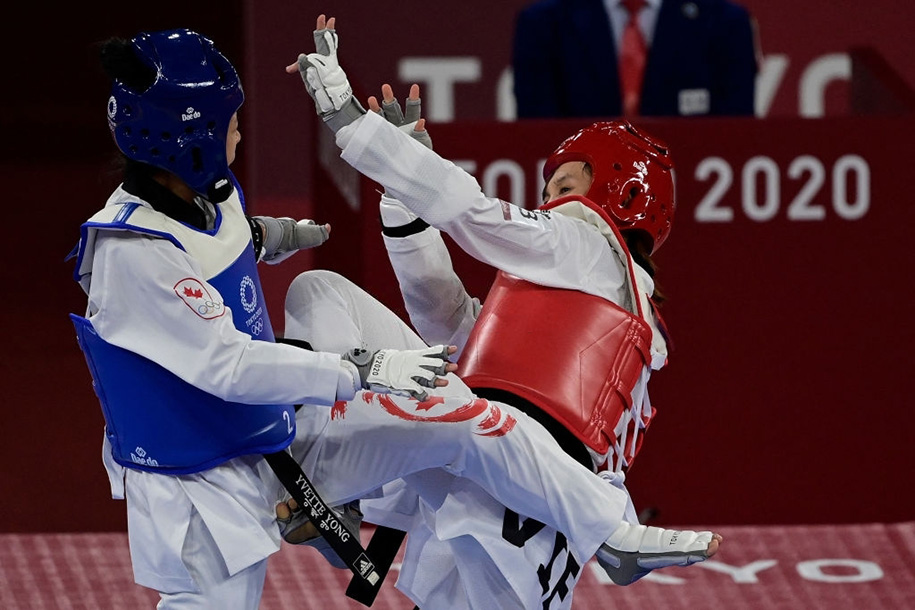 Chùm ảnh: Kim Tuyền vượt trội đối thủ Canada ngày ra quân Olympic