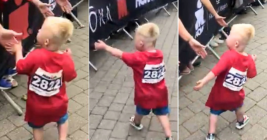 Cậu bé 5 tuổi bị bệnh Down gây bão mạng với màn đập tay siêu đáng yêu tại một giải chạy vui
