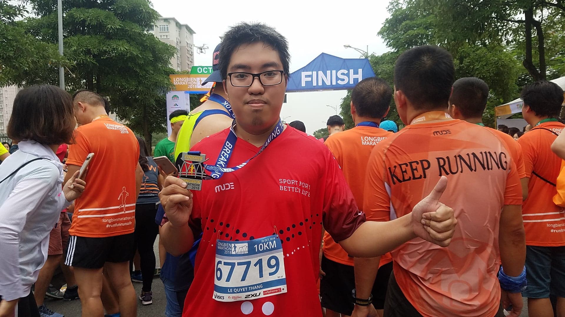 Nguyễn Tiến Hùng đánh bại Cao Ngọc Hà trên đường chạy Longbien Marathon - Ảnh 7.