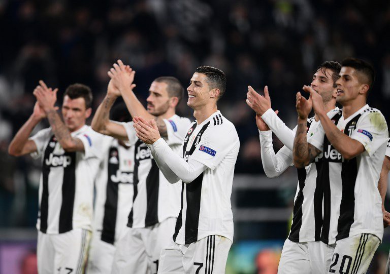 Ronaldo kiến tạo ngoạn mục và cán mốc 100 trận thắng, giúp Juventus giành vé - Ảnh 3.