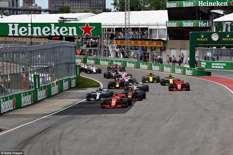 Sebastian Vettel đăng quang Canada GP, chiếm lại vị trí số 1 thế giới - Ảnh 1.