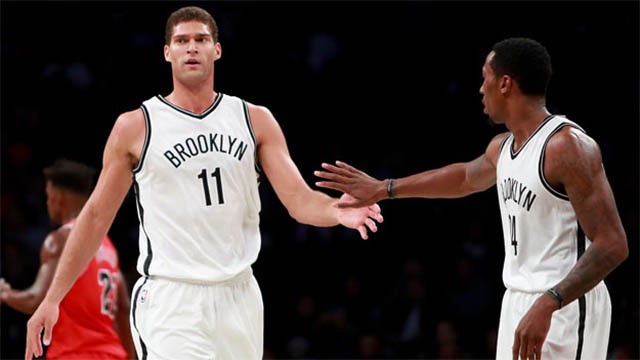 Brook Lopez, left, and Rondae Hollis-Jefferson of the Brooklyn Nets