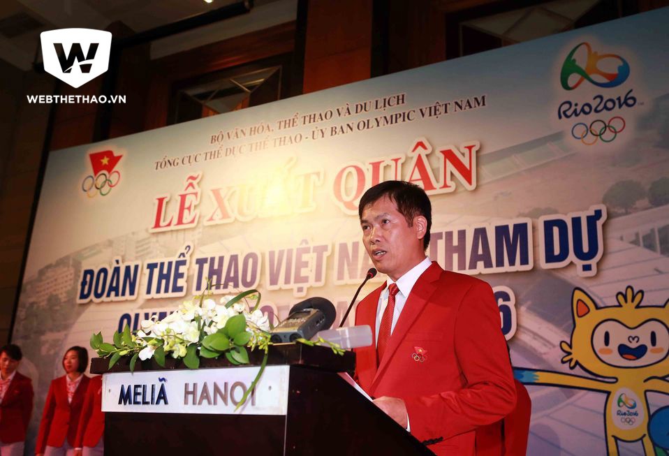 Ông Trần Đức Phấn báo cáo công tác chuẩn bị của đoàn thể thao Việt Nam