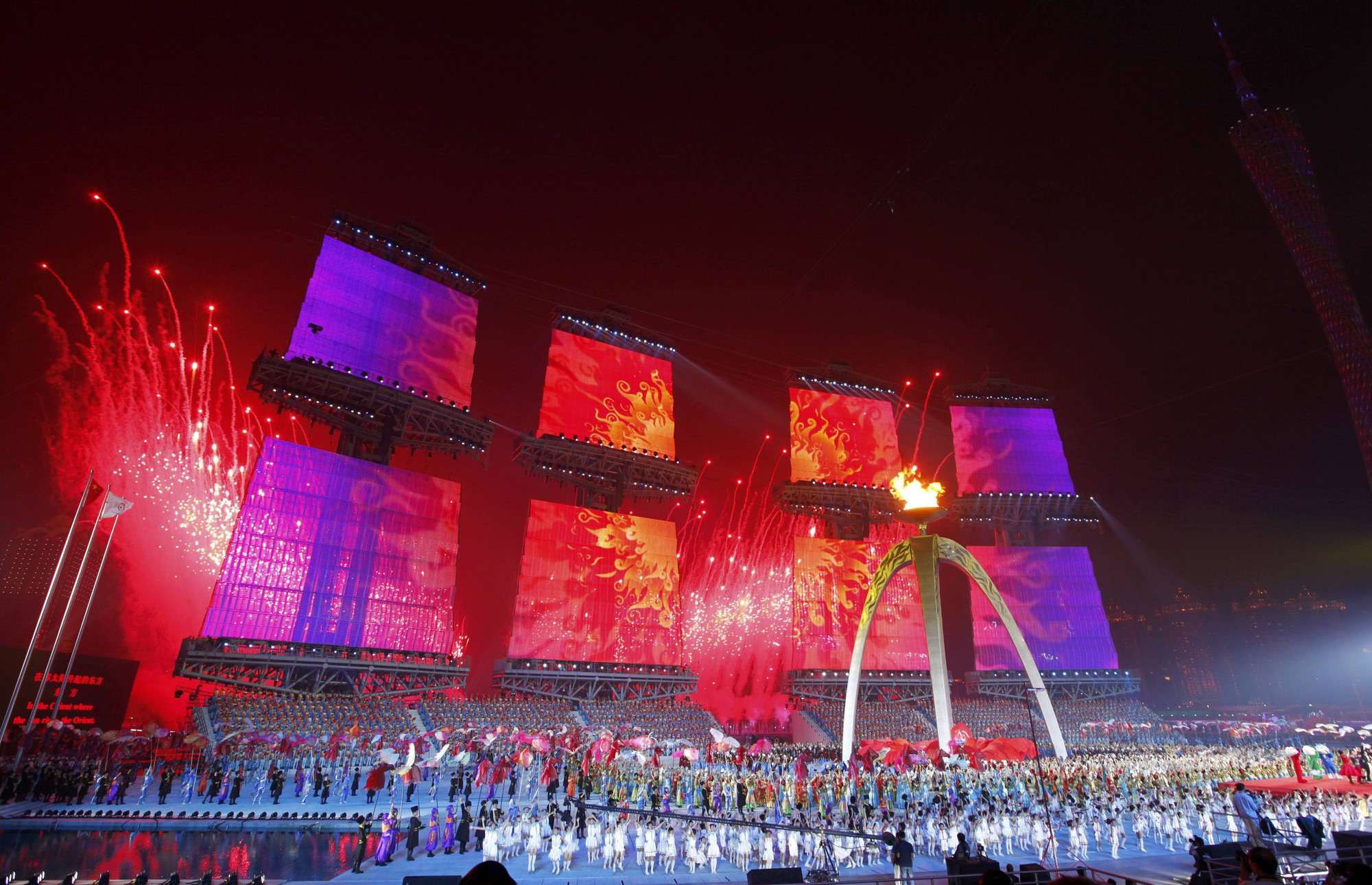 Fireworks explode during the closing ceremony of the 16th Asian Games in Guangzhou