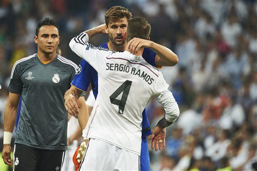 Llorente và Sergio Ramos - hai người Tây Ban Nha từng sát cánh cùng nhau ở cả Real Madrid lẫn ĐTQG, nhưng giờ đây, chỉ có một người chiến thắng