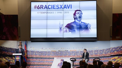 President of FC Barcelona Josep Maria Bartomeu (L) speaks during FC Barcelona's tribute to midfielder Xavi Hernandez (R) ahead of the Champions league final match in Berlin, Xavi's last match as Barcelona's player, at the Camp Nou stadium in Barcelona on June 3, 2015. AFP PHOTO / JOSEP LAGO        (Photo credit should read JOSEP LAGO/AFP/Getty Images)