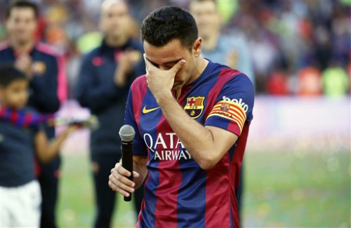 Xavi chia tay Barca và đến Qatar.
